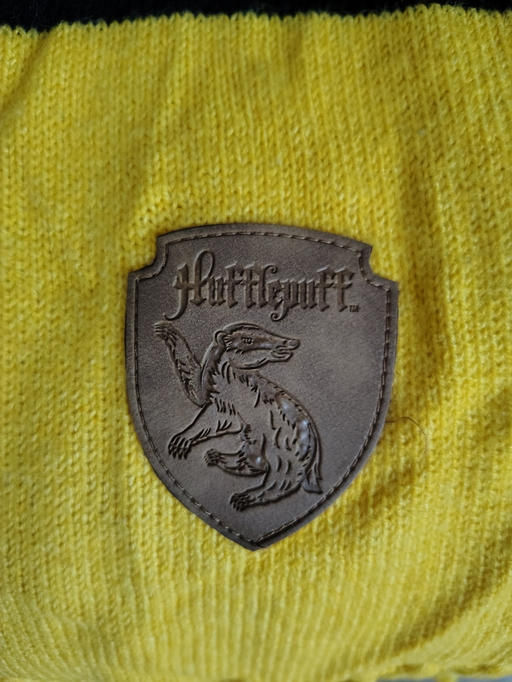Harry Potter Yellow Knit Scarf with Hufflepuff Leather Patch